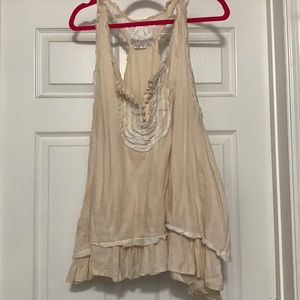 Cream sleeveless blouse